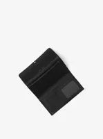 Grand portefeuille à trois volets en cuir grainé