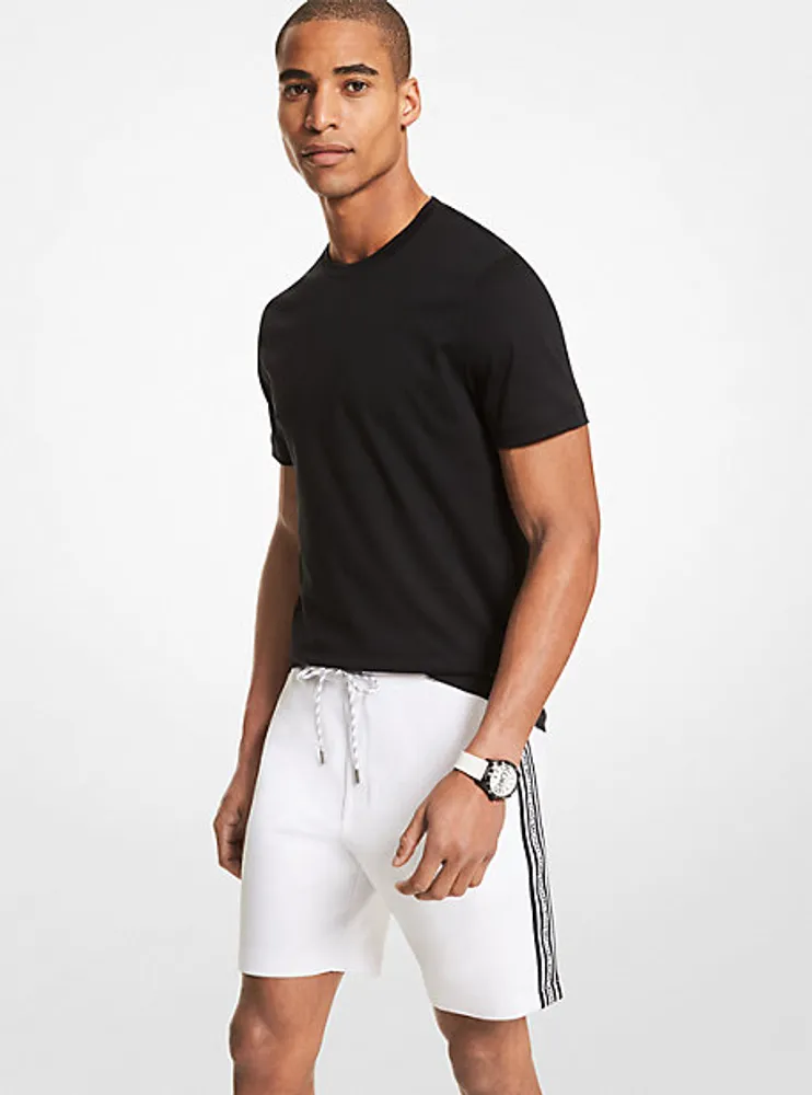 Short de jogging en mélange de coton à bande à logo