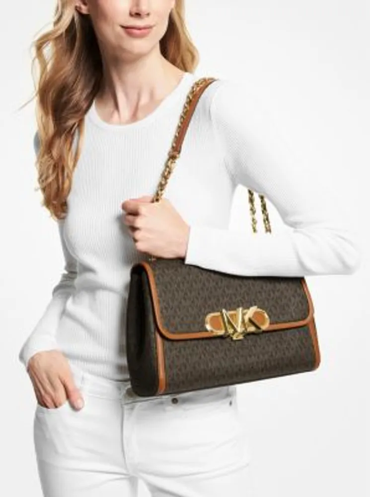 ことな様交渉中　美品　MICHAEL KORS　049　リュック　総柄　ブラック MICHAEL KORS｜マイケルコースのバックパック/リュック（その他