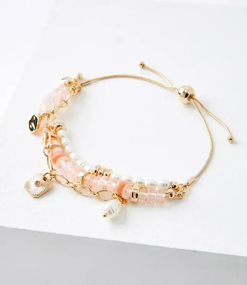 Pearlized Charm Pull Tie Bracelet