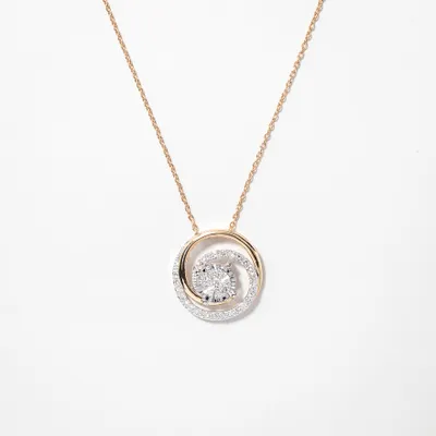 Diamond Swirl Necklace in 10K Yellow and White Gold (0.25 ct tw)