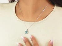 Blue Topaz Pendant Necklace with Diamond Accents in 10K White Gold