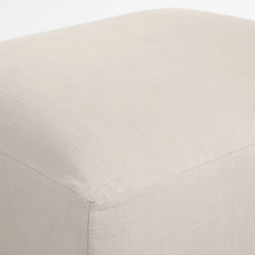 Piper Cream Slipcover Nursery Ottoman with Wood Base