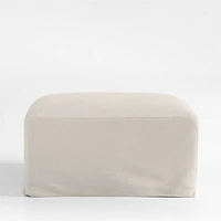 Piper Cream Slipcover Nursery Ottoman with Wood Base