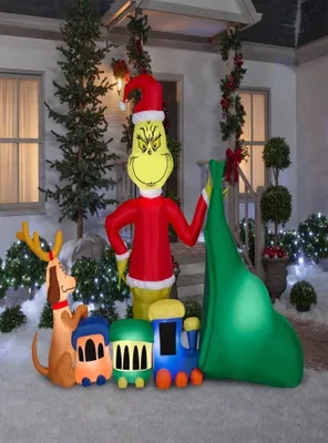The Grinch Putting Train in Santa Sack Airblown