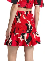 Penelope Smocked Cotton-Silk Miniskirt