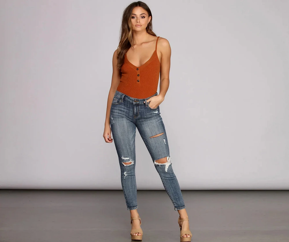 Josie Mid Rise Destructed Skinny Jeans