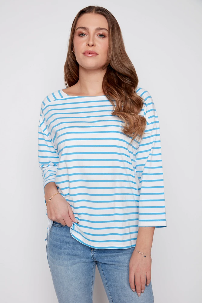 Le pull rayé col bateau