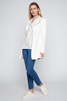 Le blazer long en similicuir avec bordure zippée