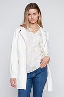 Le blazer long en similicuir avec bordure zippée
