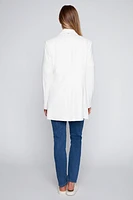 Le blazer long en similicuir avec bordure zippée