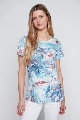 Le t-shirt à imprimé feuilles et fleurs dévoré
