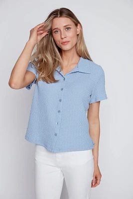 La blouse uni à manches courtes