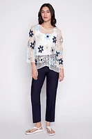 Le haut crocheté fleuri