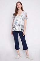 Burnout newspaper print sequin trim top