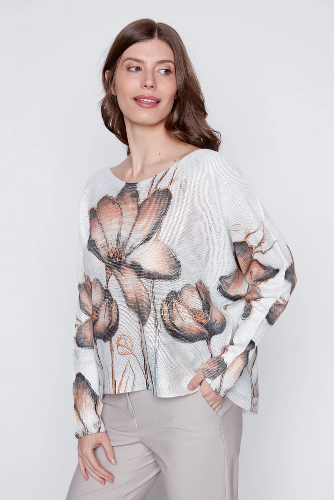 Le pull en maille imprimé fleuri