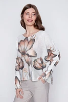 Le pull en maille imprimé fleuri