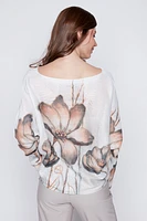 Le pull en maille imprimé fleuri