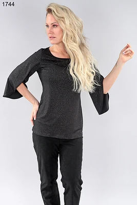 Sparkling Top with flared sleeves and openings