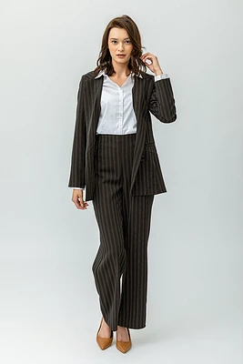 Le pantalon ample à rayures