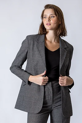 Le blazer à carreaux avec épaulettes