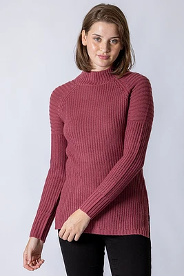 Le chandail long en tricot rose