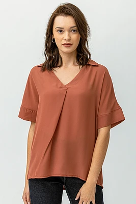 La blouse unie diaphane