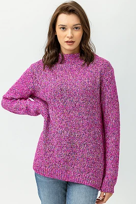 Le chandail en tricot multiton