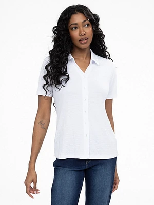 Blouse semi-ajustée à manches courtes avec boutons