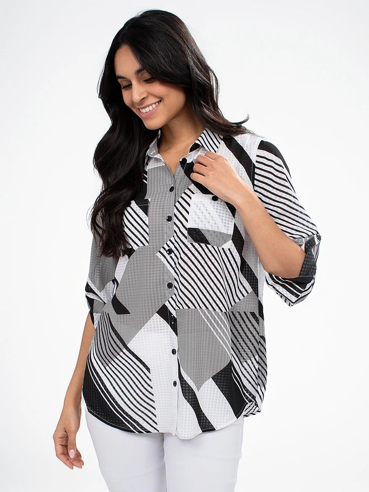 Blouse longueur tunique semi-ajustée à manches 3/4 avec boutons