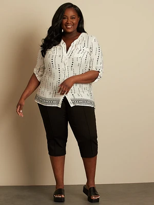 Blouse semi-ajustée à manches 3/4 avec boutons