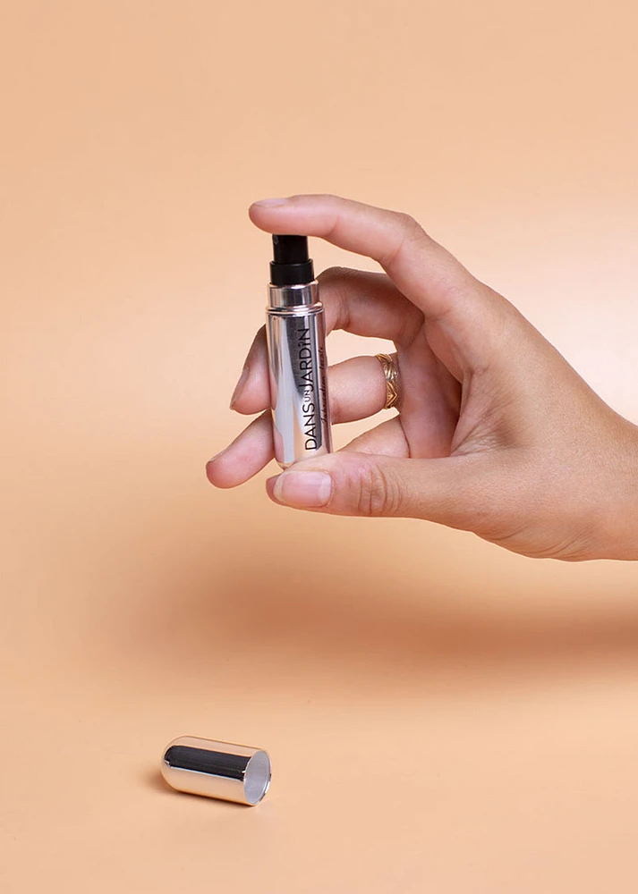 Refillable perfume bottle with spray