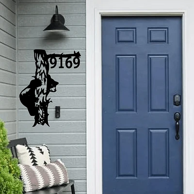 Bear with a tree address sign