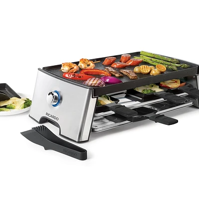 Ensemble à raclette réversible