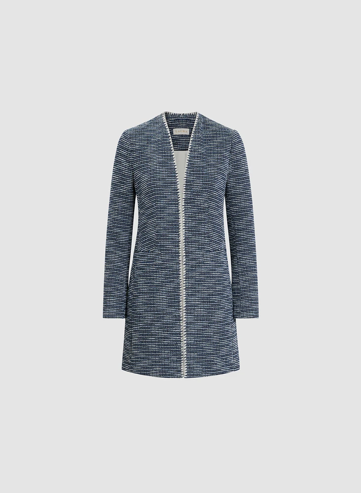 Veste longue en bouclé à bordure contrastante