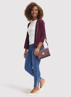 Cardigan en tricot pointelle et jean à ourlet orné