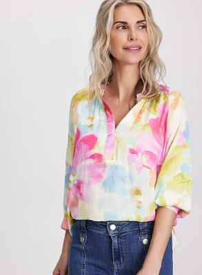Blouse florale sans col