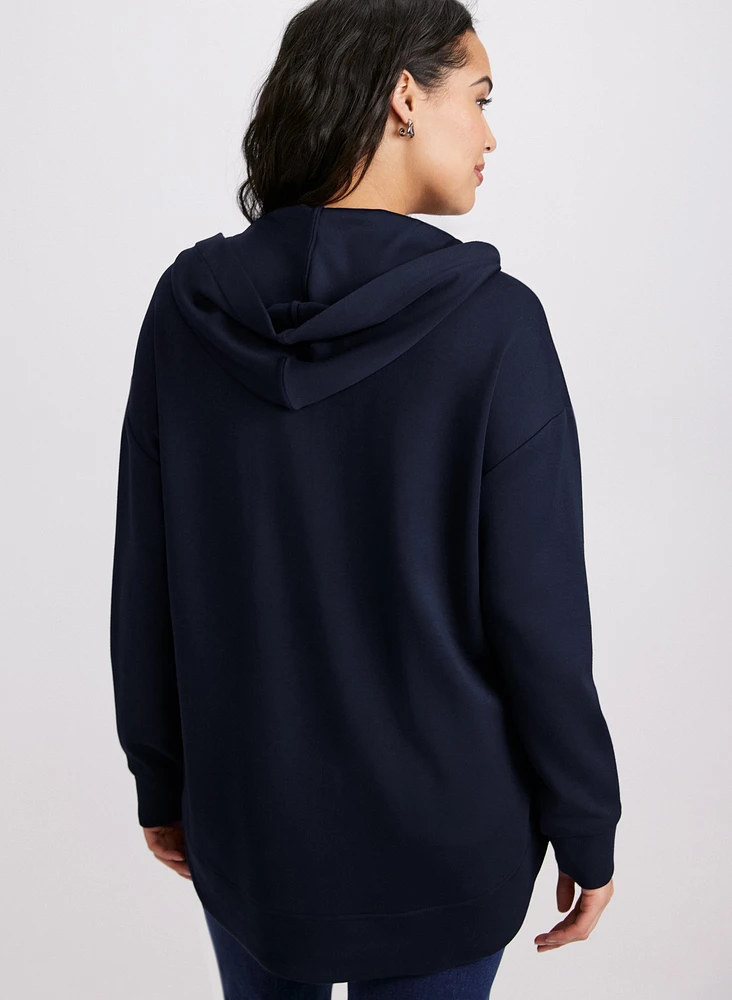 Haut zippé à capuche