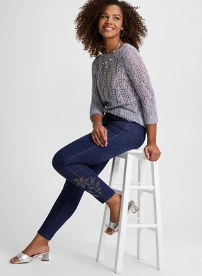 Pull ajouré et jean étroit 
