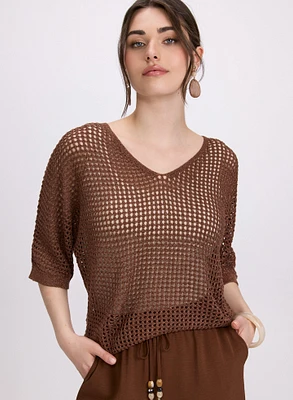 Pull en tricot ajouré