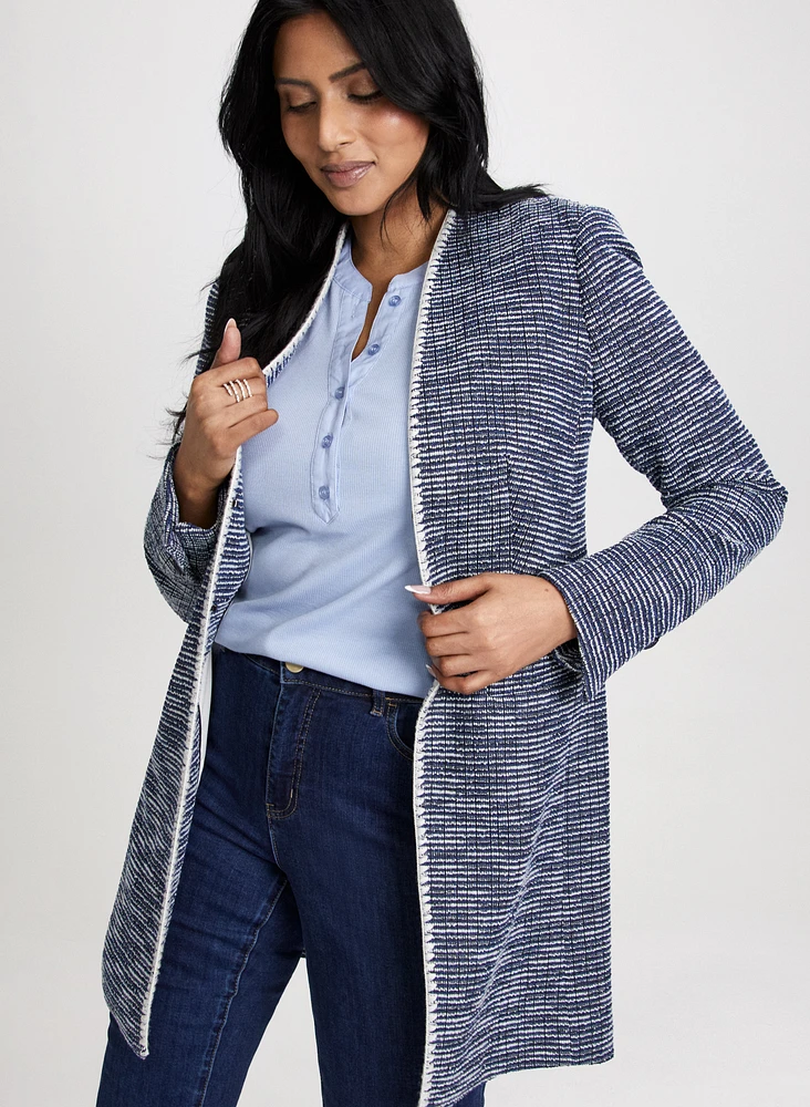 Veste longue en bouclé à bordure contrastante