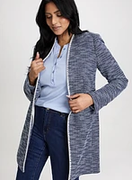 Veste longue en bouclé à bordure contrastante