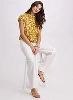 Blouse à manches cape
