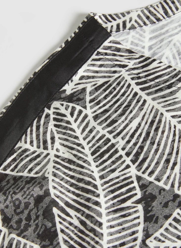 T-shirt à motif de feuilles
