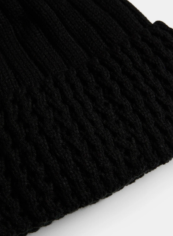 Tuque en tricot côtelé à pompon