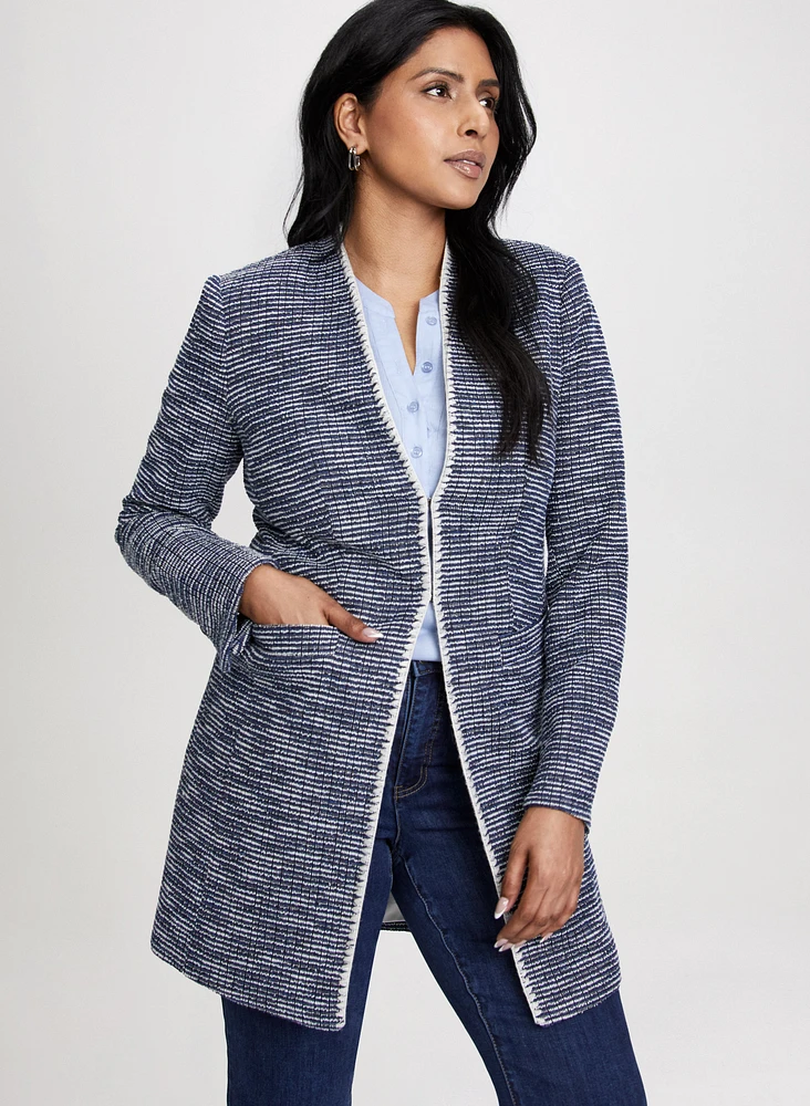Veste longue en bouclé à bordure contrastante