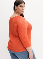 Pull en tricot ajouré