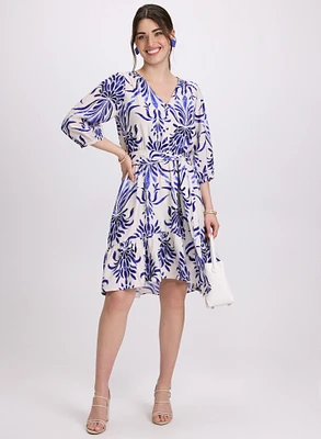Robe florale à manches coude