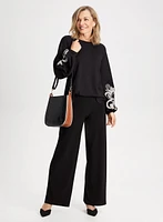 Haut à broderies et pantalon large