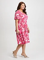 Robe florale ajustée et évasée